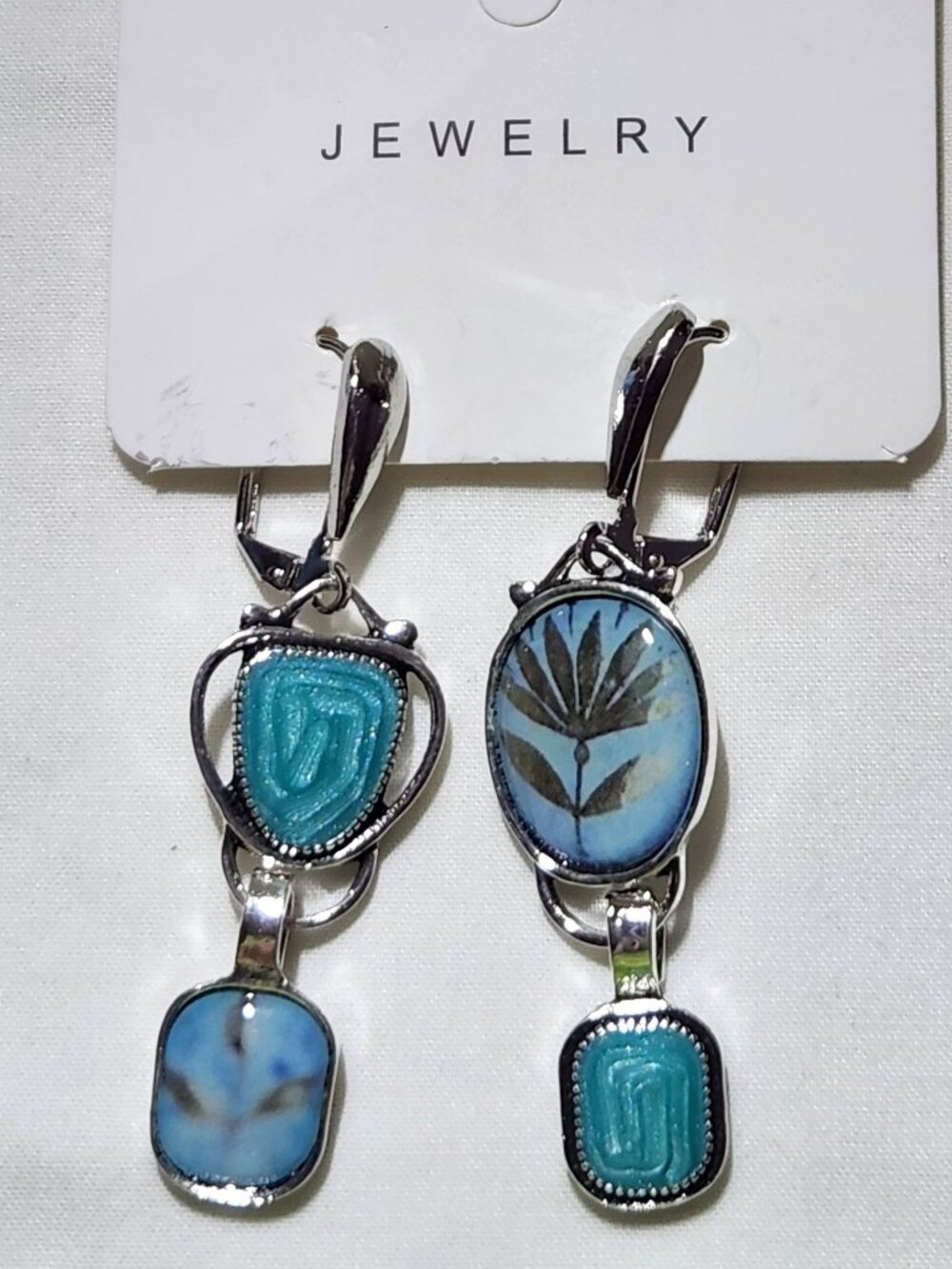 Pretty mis-matched set of earrings silver tone with blue stones NIP